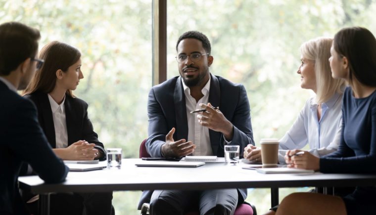 Man Speaking in a Business Meeting