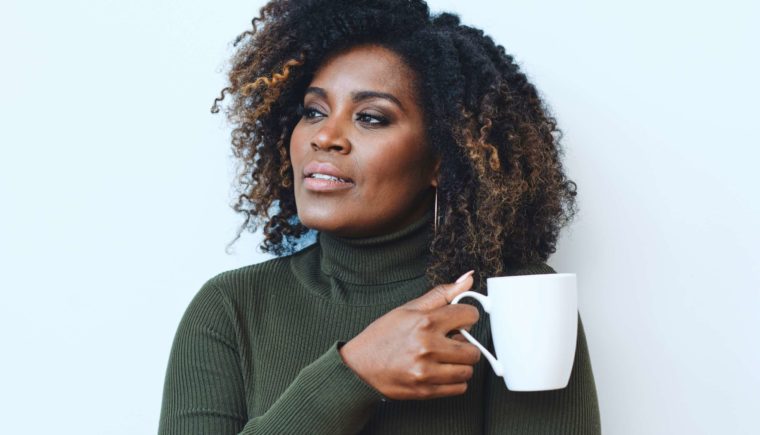 Woman Thinking and Drinking Coffee