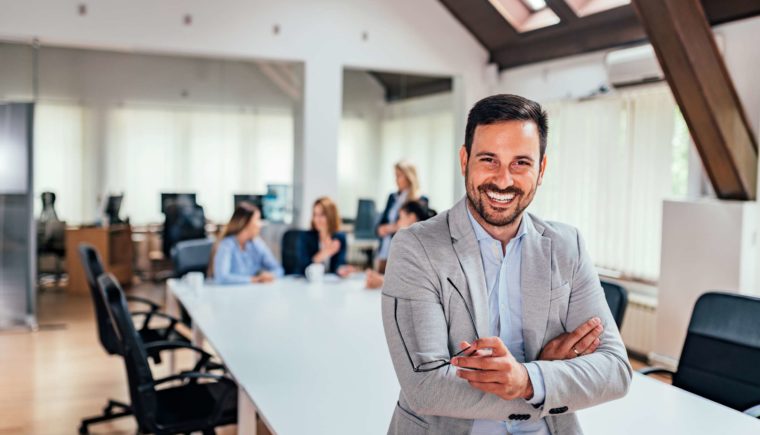 Smiling Executive at a Business Meeting