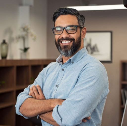 Smiling Man with Arms Crossed