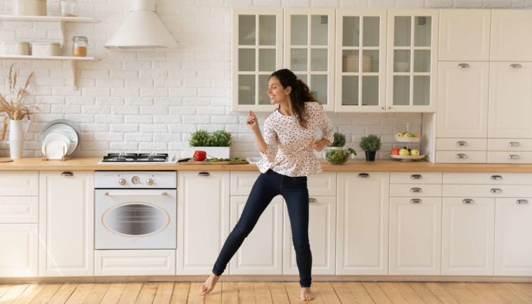 Woman Dancing in Her Kitchen