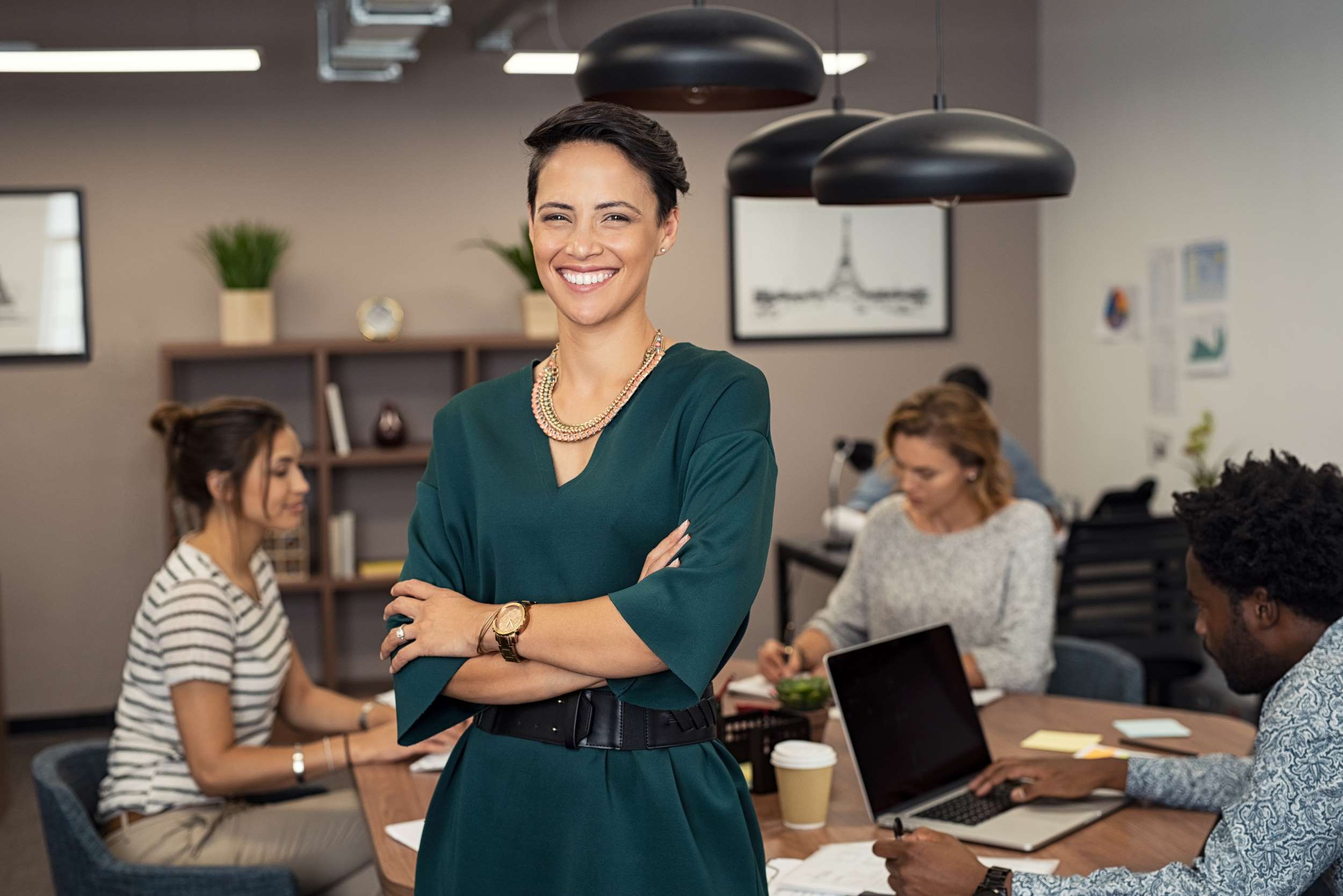 Smiling Woman Standing in an Office