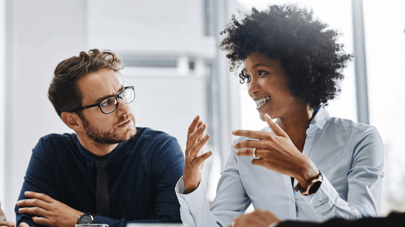 Colleagues having a discussion at work