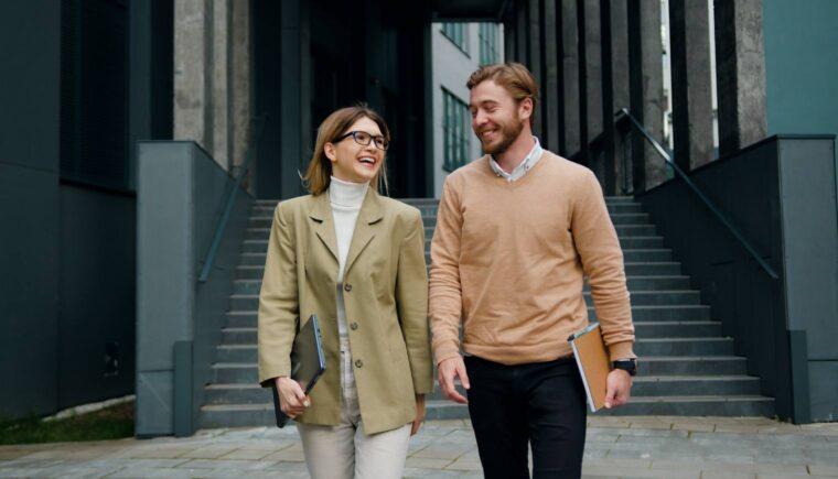 Two colleagues walking and talking
